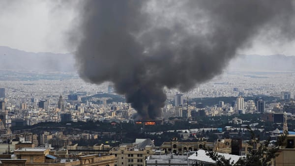 image of a burning building from a safe vantage point